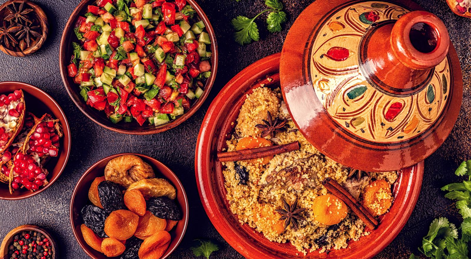 Traditional Moroccan cuisine with tajine, couscous, and fresh salads